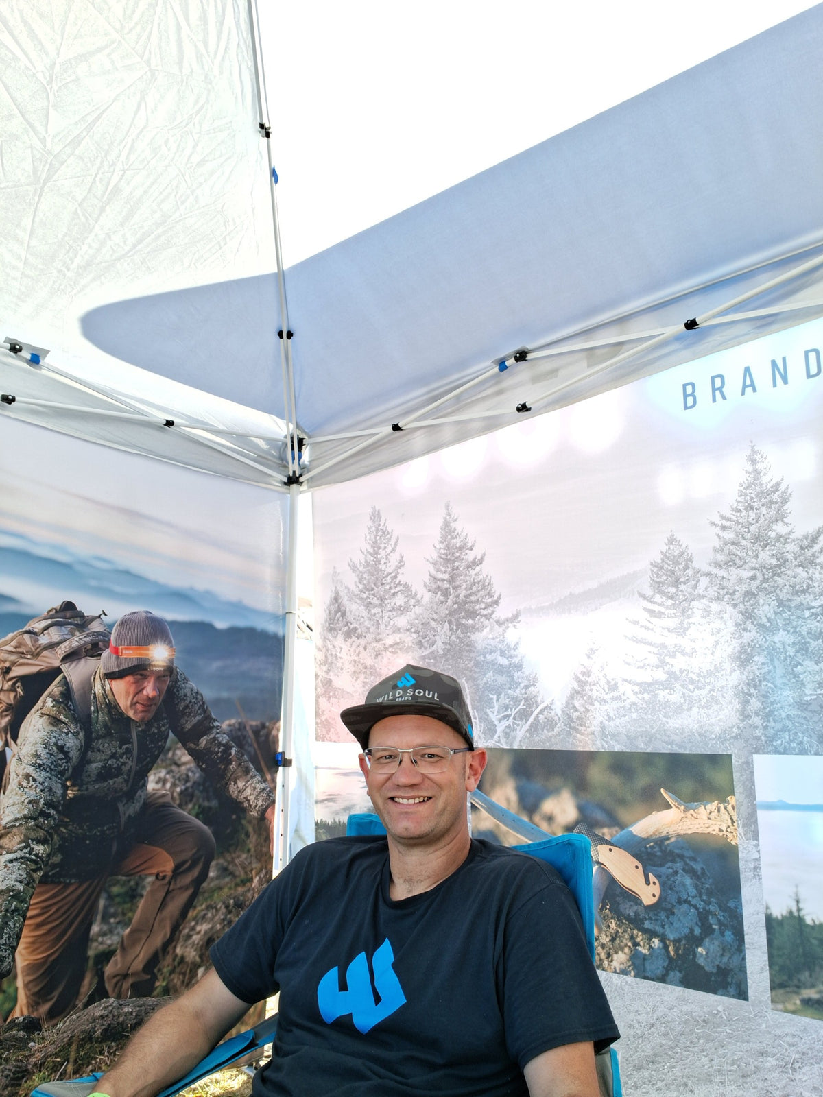Founder seated inside the Wild Soul Brand booth tent
